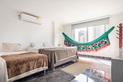 Ένα ή περισσότερα κρεβάτια σε δωμάτιο στο Casa Eloisa I-Cozzy and quiet Playa Salguero