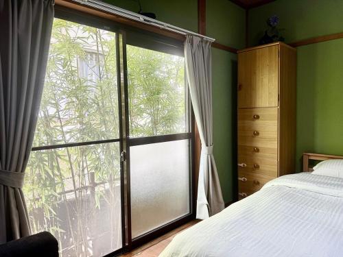 En eller flere senge i et værelse på 一隅居