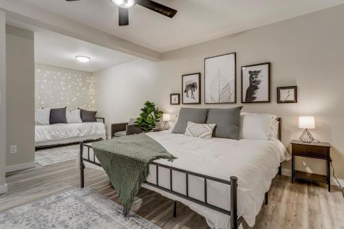 a bedroom with a large bed and a couch at 4925 Pike Unit2 in Cascade-Chipita Park