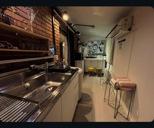 Kuchyň nebo kuchyňský kout v ubytování gam rooftop