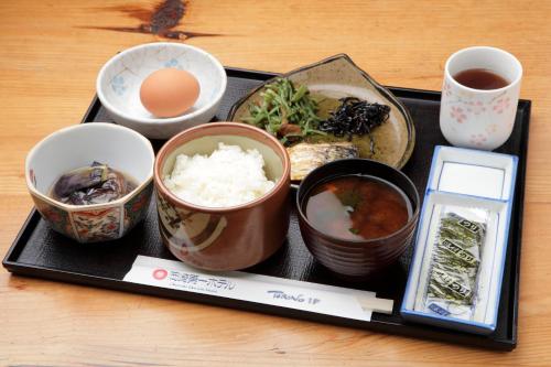 a tray with a variety of food on a table at Okazaki Daiichi Hotel in Okazaki