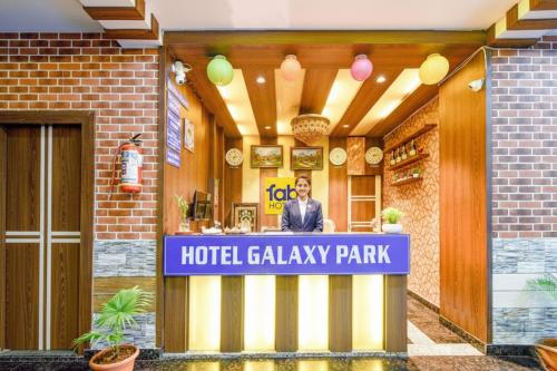 a hotel lobby with a sign that reads hotel gallery park at FabHotel Galaxy Shamshabed - Nr Hyderabad International Airport, Shamshabad in Shamshabad
