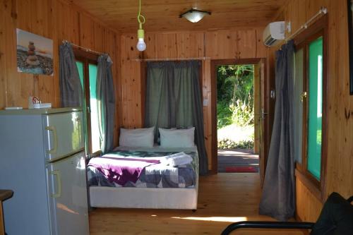 Ένα ή περισσότερα κρεβάτια σε δωμάτιο στο Onda Azul Family Unit