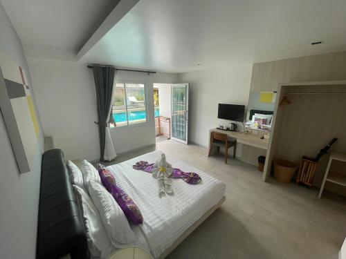 Krevet ili kreveti u jedinici u okviru objekta Lanta Corsica Hotel