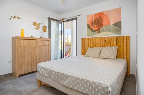 Postel nebo postele na pokoji v ubytování Le Lys du Lagon T4 - Escale entre mer et jardin privé