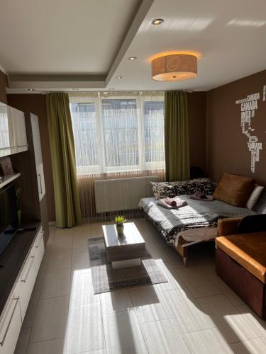 Posedenie v ubytovaní Platina Apartman