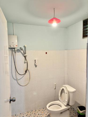 a bathroom with a shower and a toilet at Palmthien Pool Villa Aonang in Ao Nang Beach