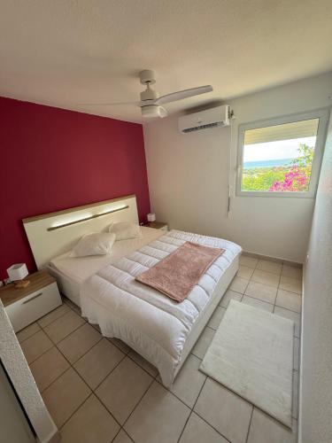 Ένα ή περισσότερα κρεβάτια σε δωμάτιο στο Peace Wood