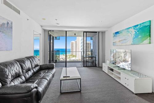 Телевизор и/или развлекательный центр в Circle on Cavill - Hosted by Coastal Letting Co.