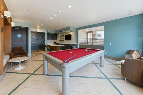 a room with a pool table in a room at The Heart Of Hollywood Hills in Los Angeles