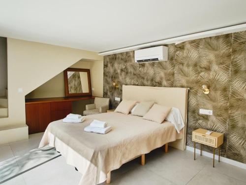 Ένα ή περισσότερα κρεβάτια σε δωμάτιο στο Villa Zafiro