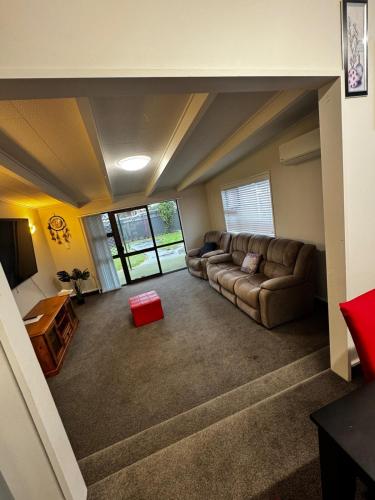 an overhead view of a living room with a couch at Relax In Mosgiel in Mosgiel