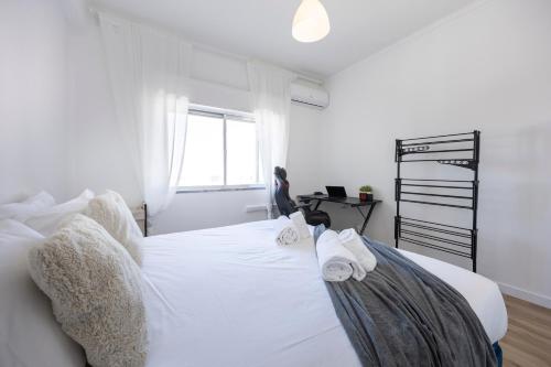 Ένα ή περισσότερα κρεβάτια σε δωμάτιο στο Nordic Breeze