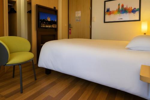 Giường trong phòng chung tại ibis Lyon Part Dieu Les Halles