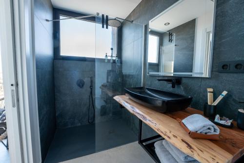 Koupelna v ubytování Casa Horizon, piscine chauffée, Lajares