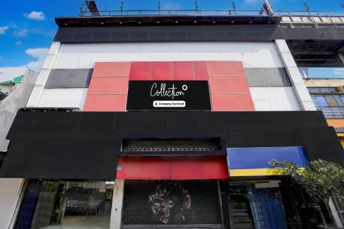 a building with a sign on the side of it at Collection O Jhalwar Road in Kota