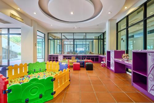 a childrens play area with a lego train at The Heritage Pattaya Beachfront Resort in Pattaya South