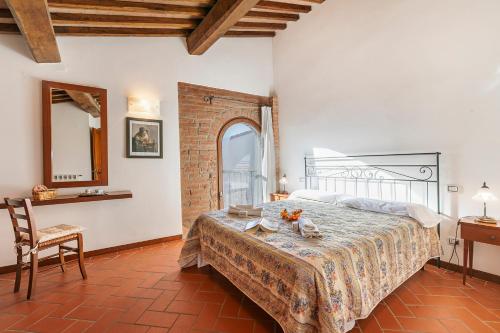 Ένα ή περισσότερα κρεβάτια σε δωμάτιο στο Amazing Chianti Site