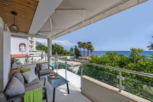 a balcony with a view of the ocean at Berengaria Court - Sea Views 2bdr Apartment in Limassol