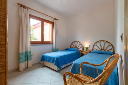 Una cama o camas en una habitación de Residence della torre