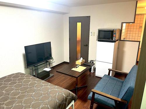 Kuchyň nebo kuchyňský kout v ubytování KIYAZA Louvre Sapporo