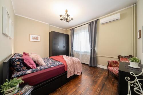 a bedroom with a bed and a window at Top Center 2 Aptartments - Gurko Str in Sofia