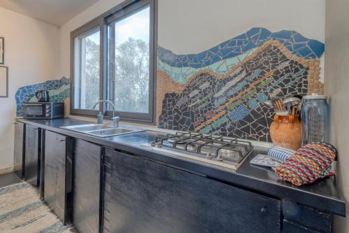 Kuchyň nebo kuchyňský kout v ubytování Masseria Il Fondone Up