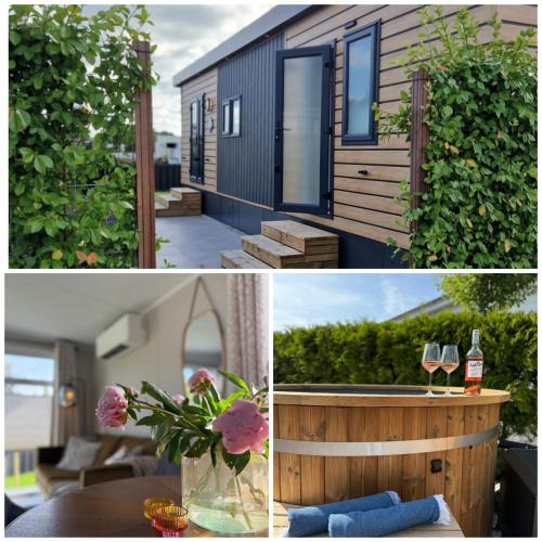 a house with a vase of flowers on a table at TETchalet met wellness tuin in Berkhout