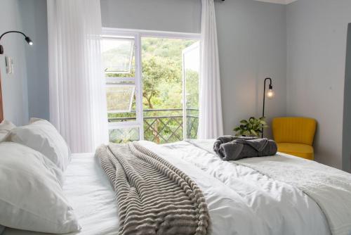 Postel nebo postele na pokoji v ubytování Le Opstal, a Scenic Farm Stay near Rustenburg