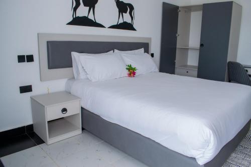 Postel nebo postele na pokoji v ubytování The Orchard 4 degrees South