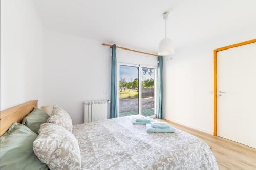 Postel nebo postele na pokoji v ubytování Casa do Sobreiro