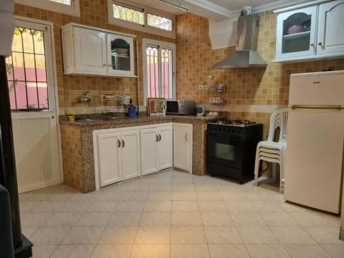 Kuchyň nebo kuchyňský kout v ubytování Appartement Imi-Ouaddar 2
