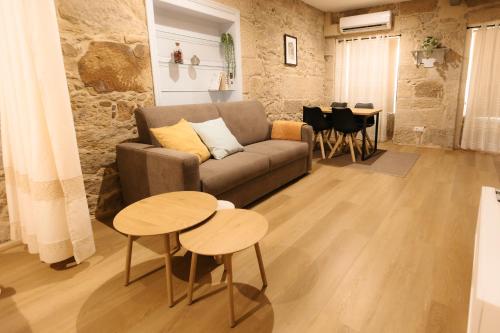 Posezení v ubytování Castellum Tude Apartamento