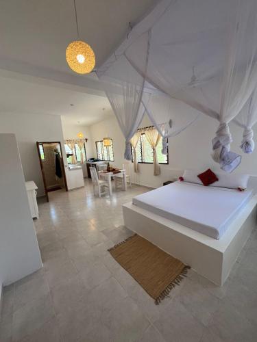 Ένα ή περισσότερα κρεβάτια σε δωμάτιο στο Arcade Comfort Suite