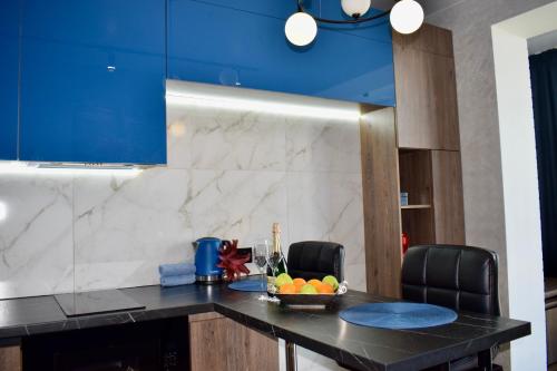 Η κουζίνα ή μικρή κουζίνα στο Дизайнерські апартаменти в ЖК DreamTown 10А