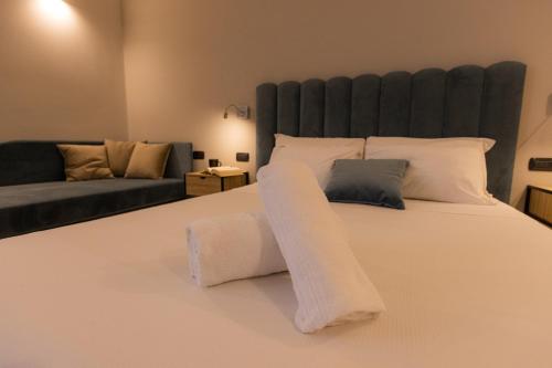 En eller flere senge i et værelse på Relais At Via Veneto