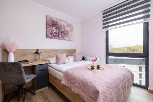 Stylish Apartment with a Balcony Ideal for Remote Work by Noclegi Renters