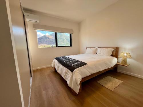 En eller flere senge i et værelse på Summit & Sea Penthouse