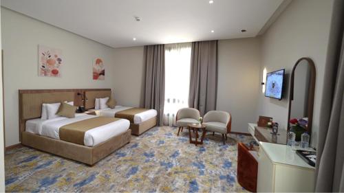 Ένα ή περισσότερα κρεβάτια σε δωμάτιο στο Jewel Plaza Banha hotel