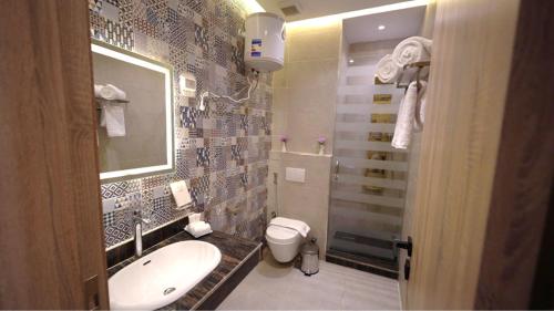 Ένα μπάνιο στο Jewel Plaza Banha hotel