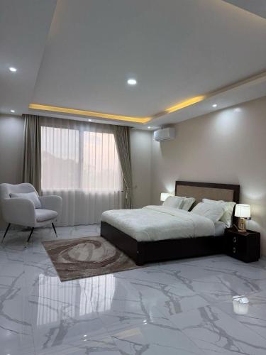 Postel nebo postele na pokoji v ubytování Maison Kololo