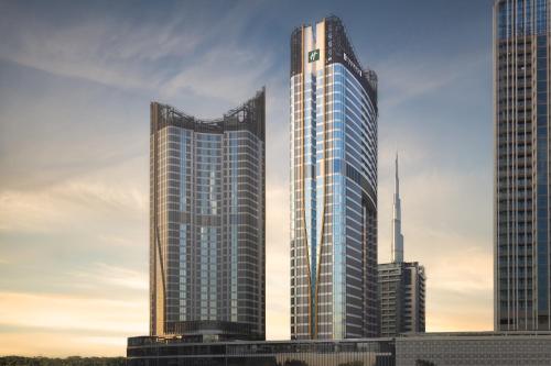 a rendering of a tall building in a city at Holiday Inn Dubai Business Bay by IHG in Dubai