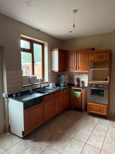 Η κουζίνα ή μικρή κουζίνα στο EN-SUITE Luxurious Room