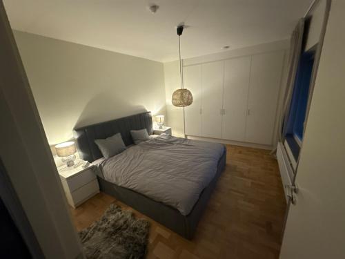 Postel nebo postele na pokoji v ubytování Modern corner apartment