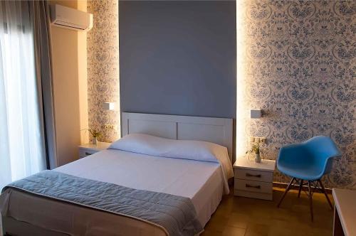 Posteľ alebo postele v izbe v ubytovaní Hyacinthus-Cressida Seaside Apartments
