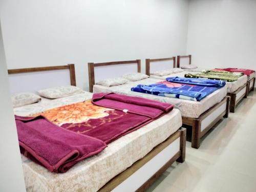 Postel nebo postele na pokoji v ubytování new hambala home stay