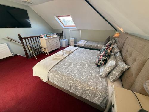 Ліжко або ліжка в номері Cambridge Bed & Breakfast