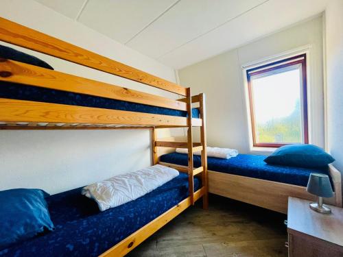 En eller flere senge i et værelse på Liguster 42*