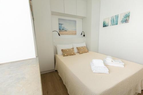 Ένα ή περισσότερα κρεβάτια σε δωμάτιο στο Castle House Tavira