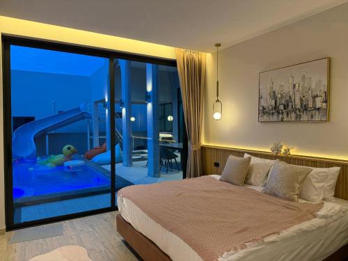 Ένα ή περισσότερα κρεβάτια σε δωμάτιο στο iL Mare Pool Villa Cha-am